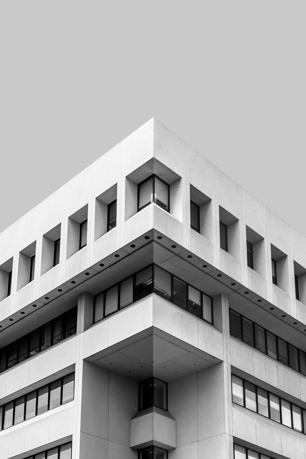 A black and white image of the Alberta Courts Building in Edmonton, AB.